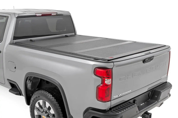 Rough Country Hard Tri-Fold Flip Up Bed Cover | 2020+ Silverado / Sierra HD | 6' 9" Bed