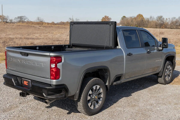 Rough Country Hard Tri-Fold Flip Up Bed Cover | 2020+ Silverado / Sierra HD | 6' 9" Bed
